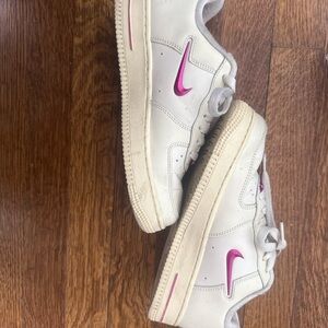 White Nike Air Jordan with Pink Accent